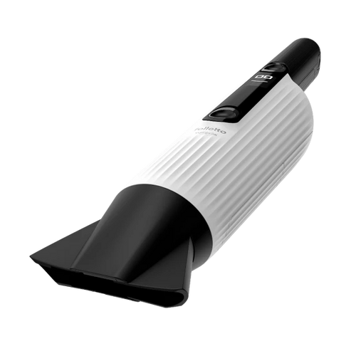 Aspirabriciole Folletto VM7 in uso su piano cucina